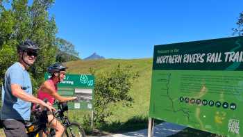 Couple on rail trail viewing Wollumbin,Kate Baker Couple on rail trail viewing Wollumbin